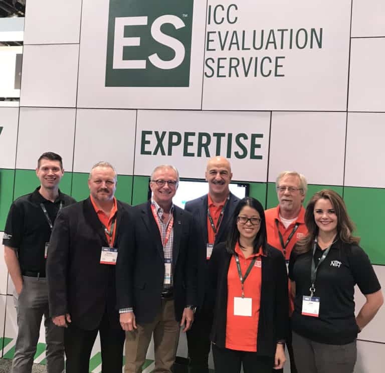 Staff members from ICC-ES are pictured at the IBS show in 2020. 