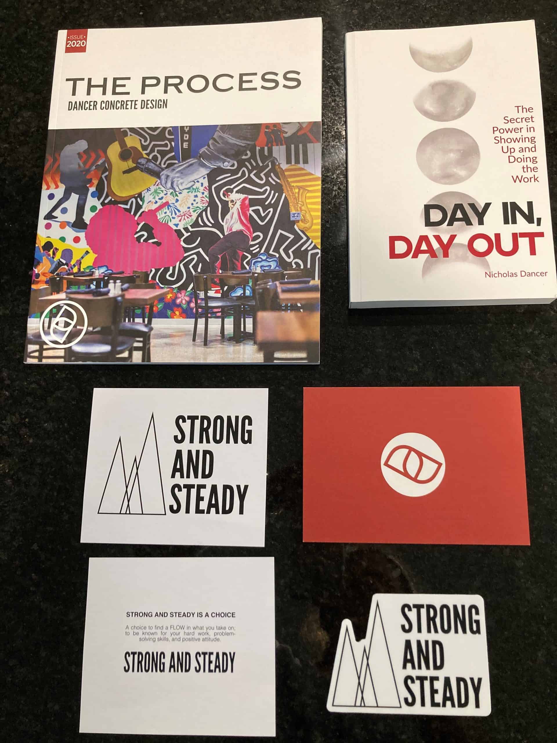 Pictured are some of Dancer Concrete's marketing materials and Dancer's own book published in 2019.