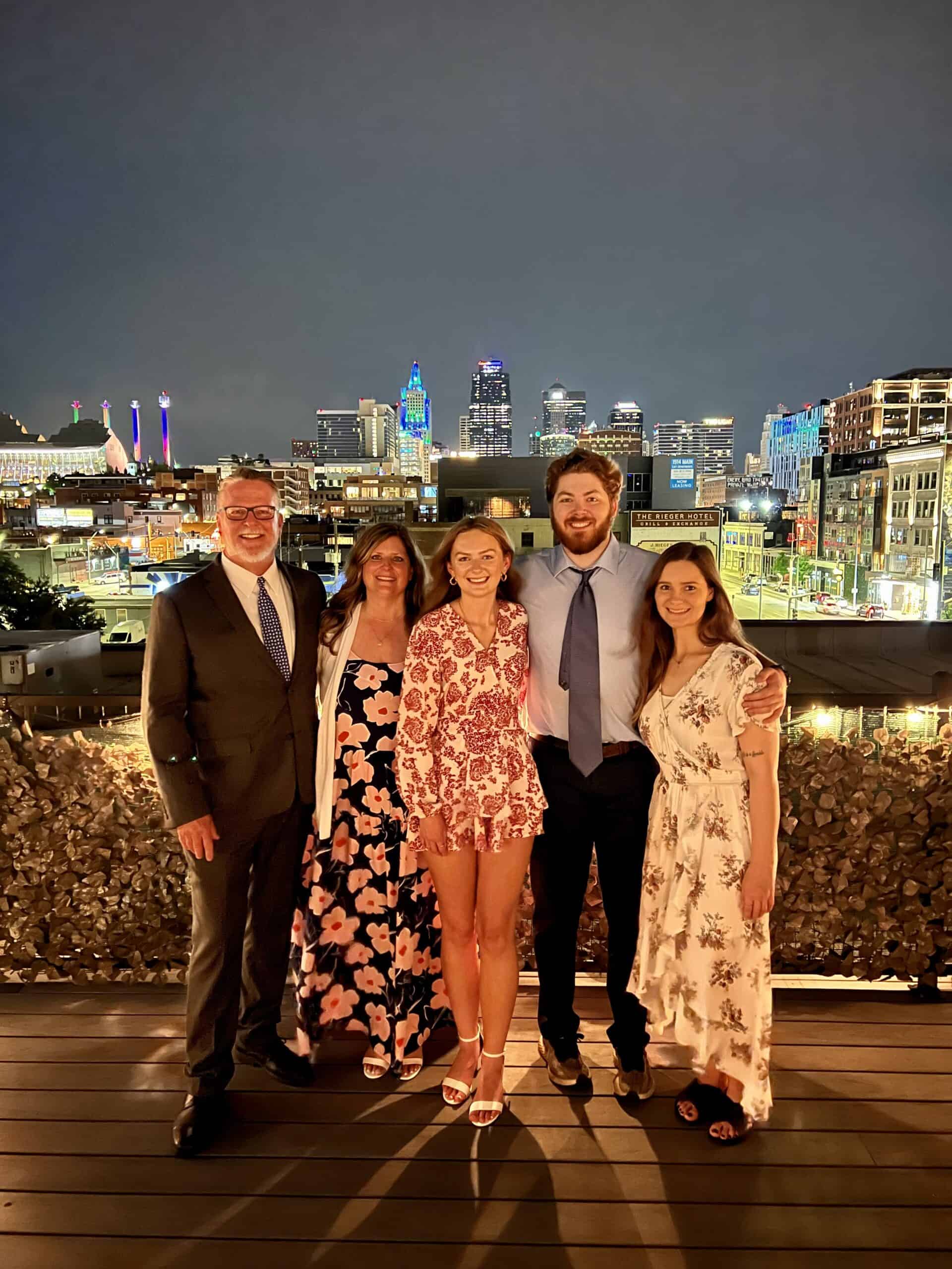 Corey's son, Tanner Thomas, recently received a degree in mechanical engineering, and his daughter, Grace Thomas (center), is currently studying fashion business at K-State.