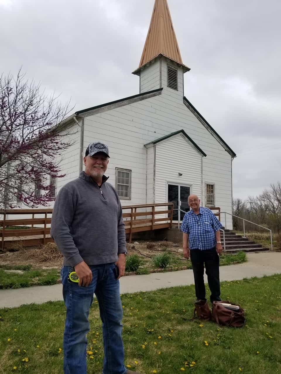 Corey Thomas, vice president of business development for Pishny, is pictured (foreground) at an upcoming project at the historic Latimer Lutheran Church in Latimer, Kan.