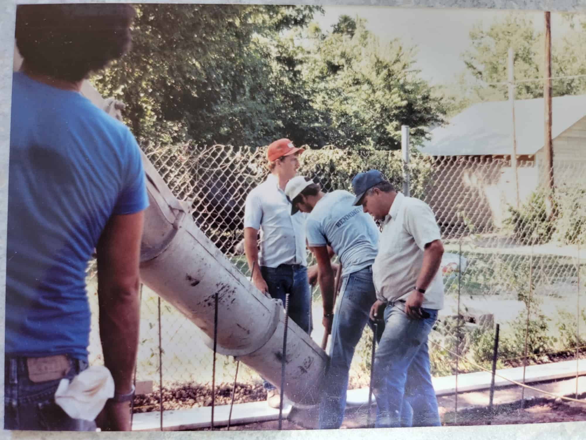 "I knew how to operate a backhoe before I drove a car," says Troy (pictured in the red hat). "I didn’t think it was that exciting back then. I just thought it was normal."