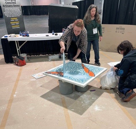 Troy's daughter Elise demonstrated a concrete art technique in Las Vegas as one of the 2023 World of Concrete’s emerging young artists.