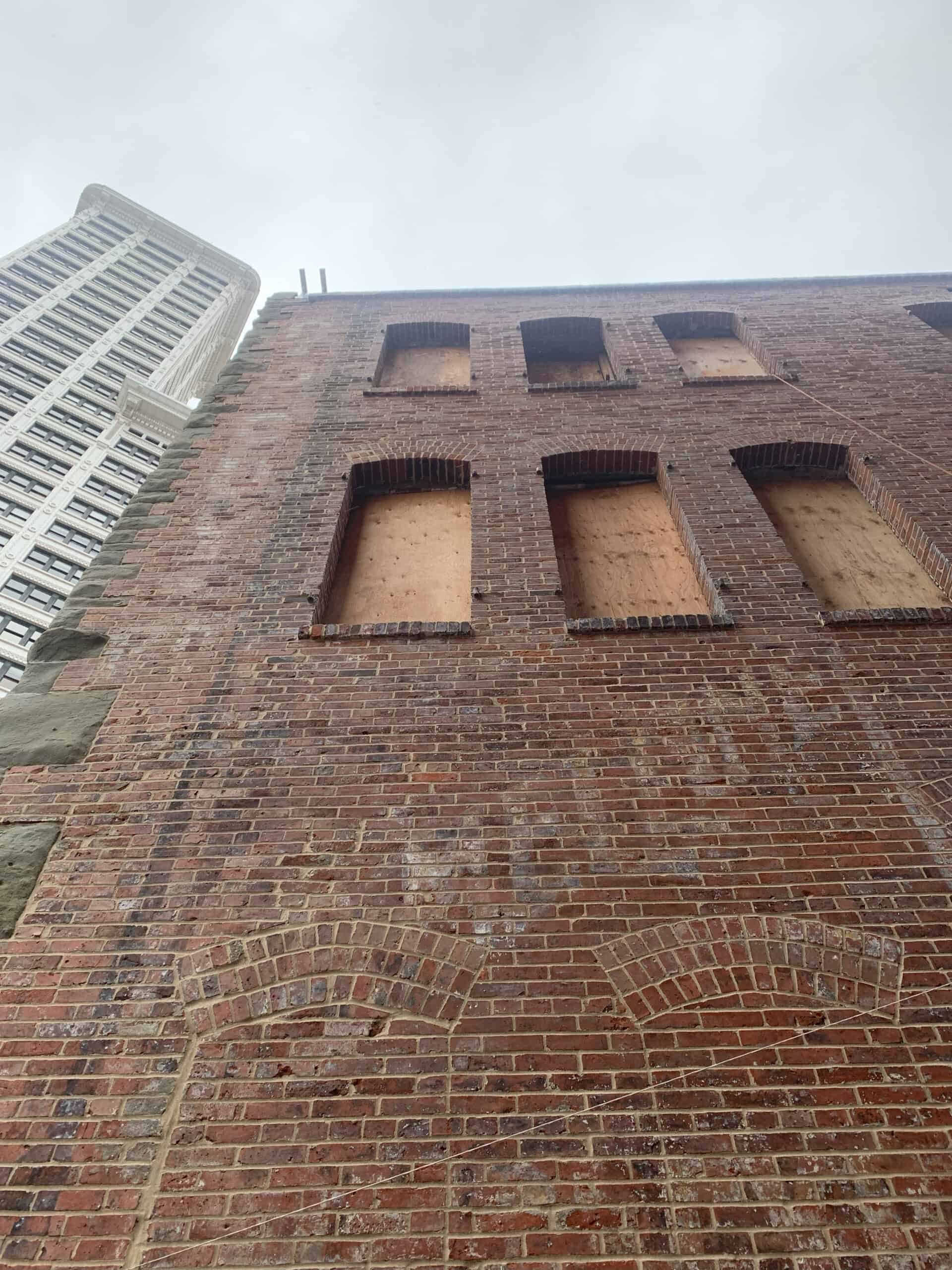 Interior and exterior brick walls were found in varying conditions. Photo courtesy BuildingWork