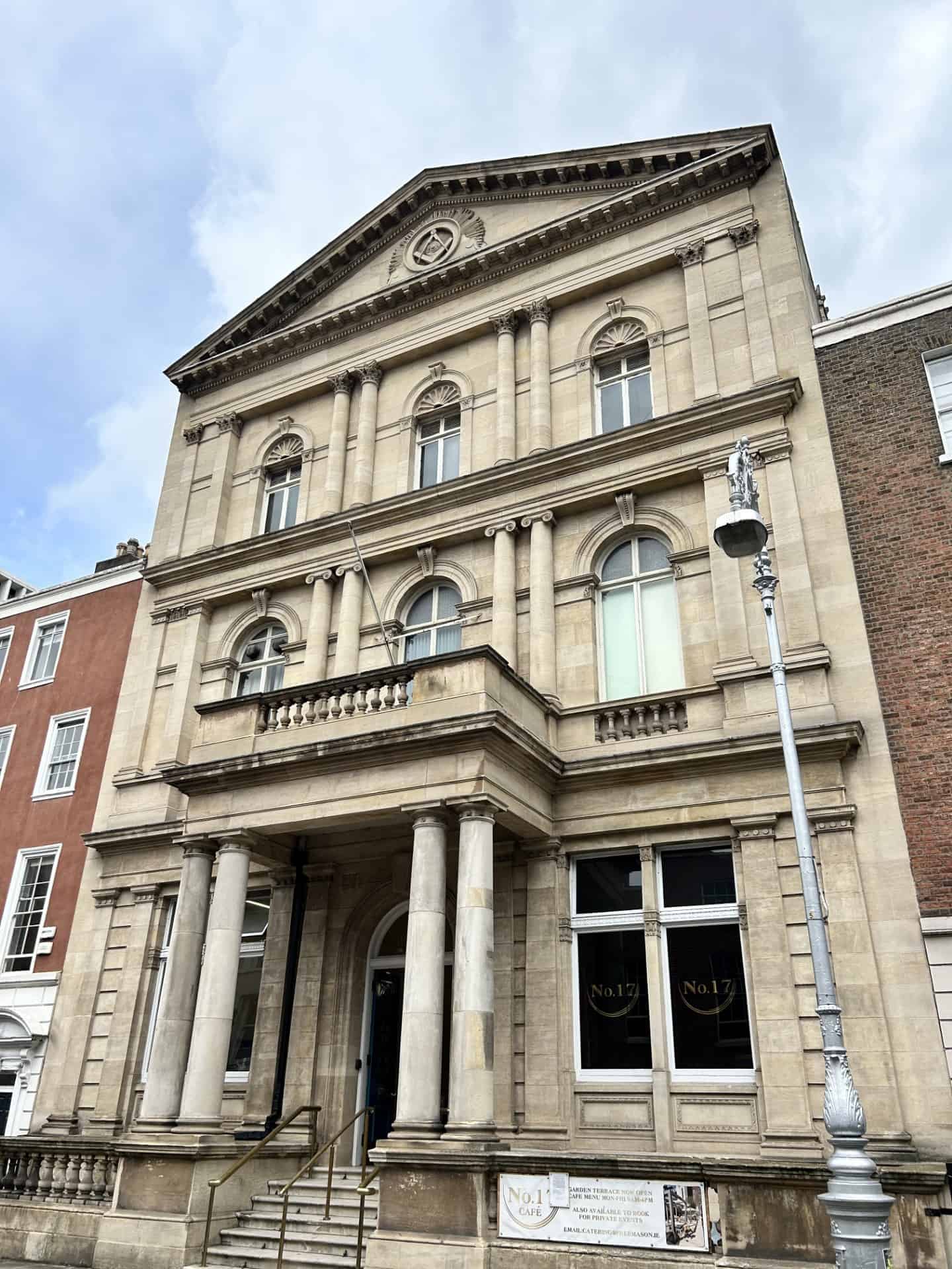 Dublin Freemasons Hall on Molesworth Street. Constructed in 1869. Designed by Edward Holmes of Birmingham, the building is designed in the Italian style demonstrating three of the orders of architecture from bottom floor to top: Doric, Ionic, and Corinthian. The building is constructed of English Ancaster Limestone. photo courtesy Shea McEnerney
