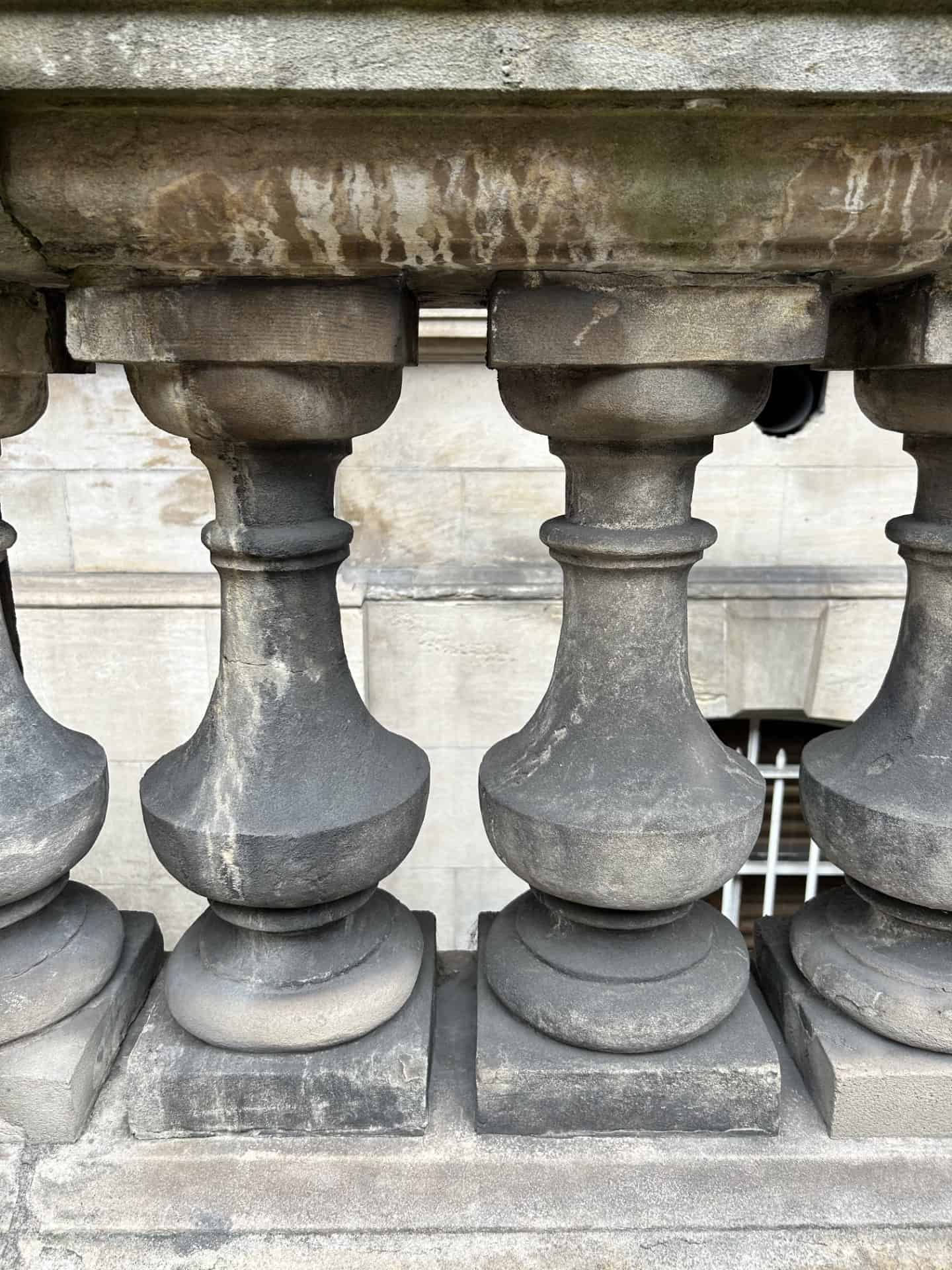 Substantial deterioration, atmospheric, and biologic staining present at the ancaster limestone balustrade affronting the Freemason’s Hall. Photo courtesy Shea McEnerney