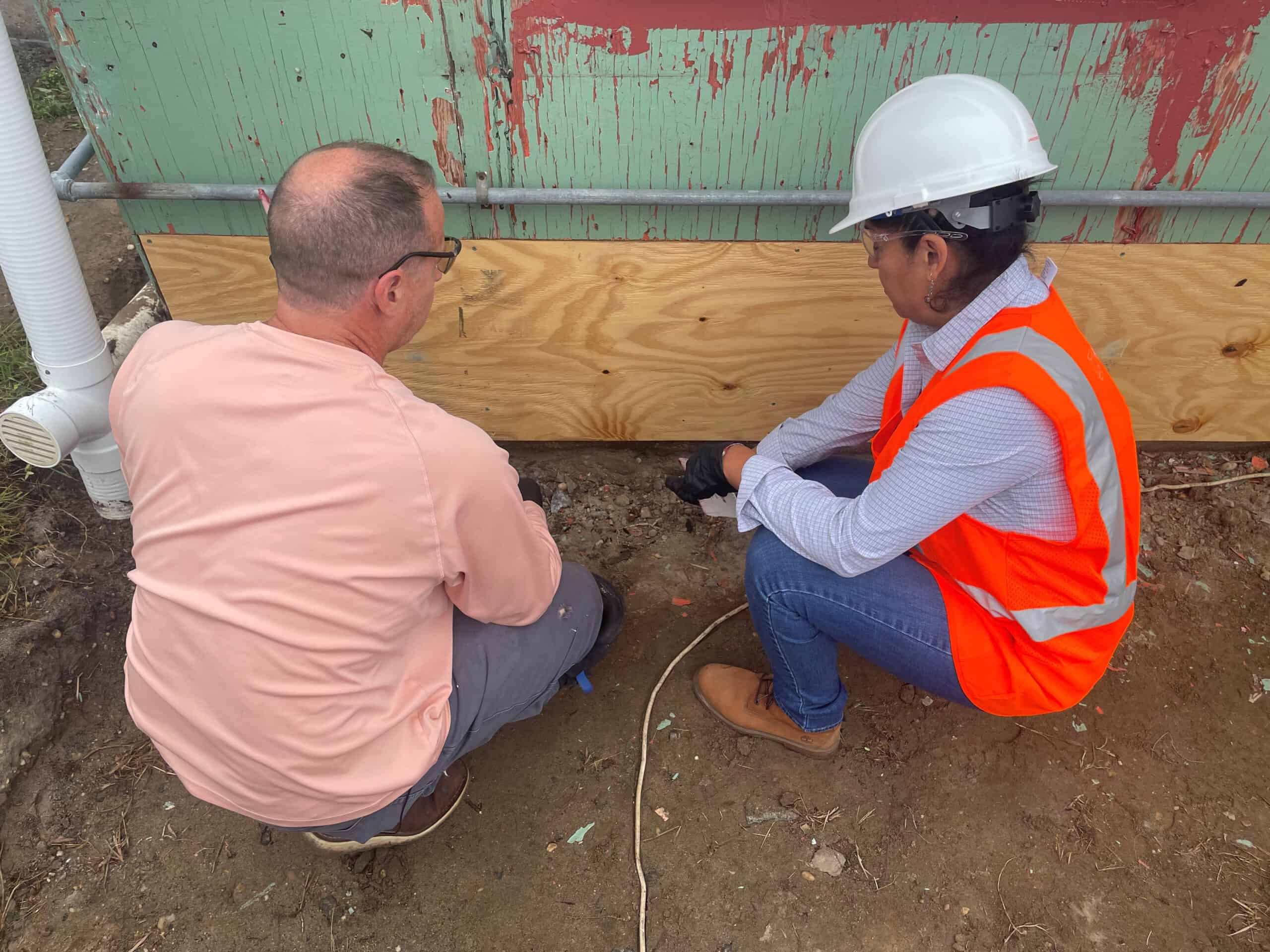 Natalie Daleney (right), Building Envelope Technical Specialist for PROSOCO, assisted on-site with the installation of Cat 5 and FastFlash on a bungalow owned by architect Robert Donahue (left). Photo courtesy Guy Mazza