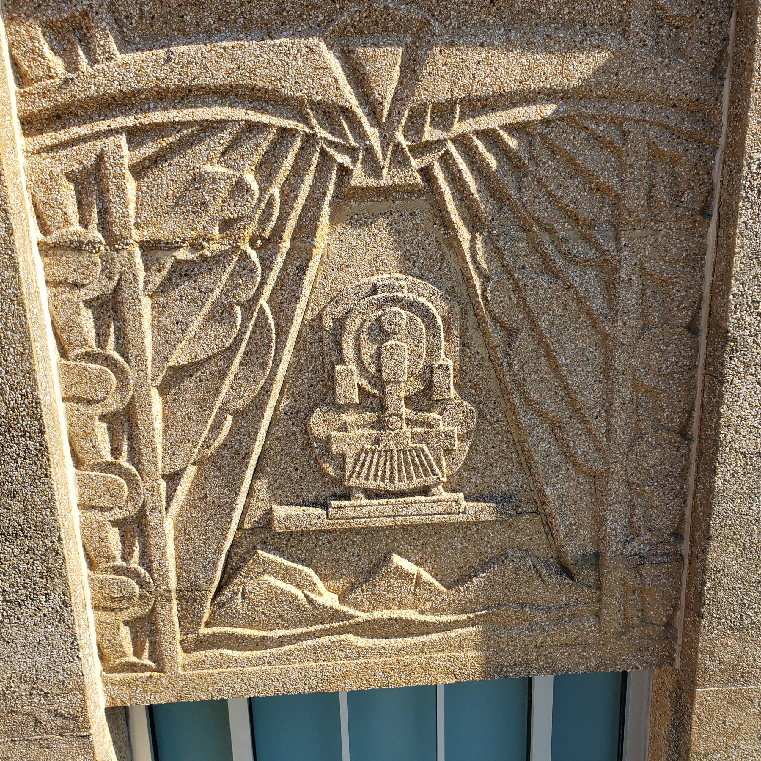 20250202_103758 Bas-relief details on the exterior of the building