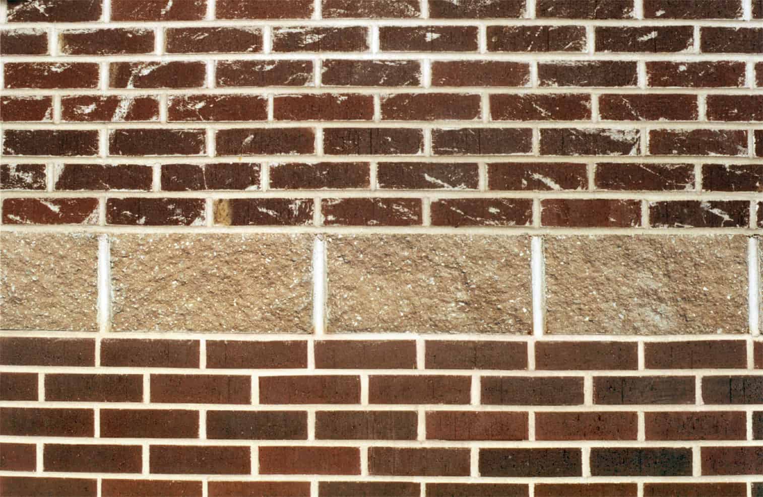 Brick and block used together on a wall